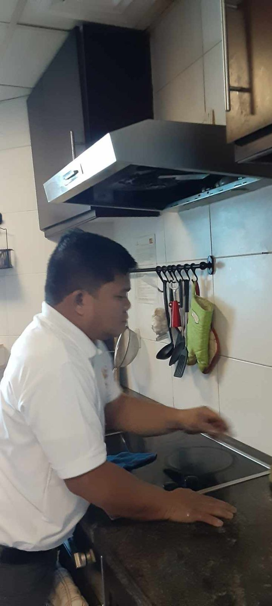 Deep Cleaning Stove in Kitchen